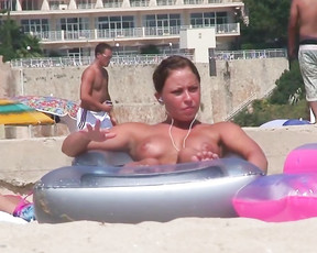 Topless naturist teen filmed by a hidden camera