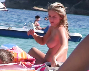 Dazzling blonde enjoys her day at a nudist resort